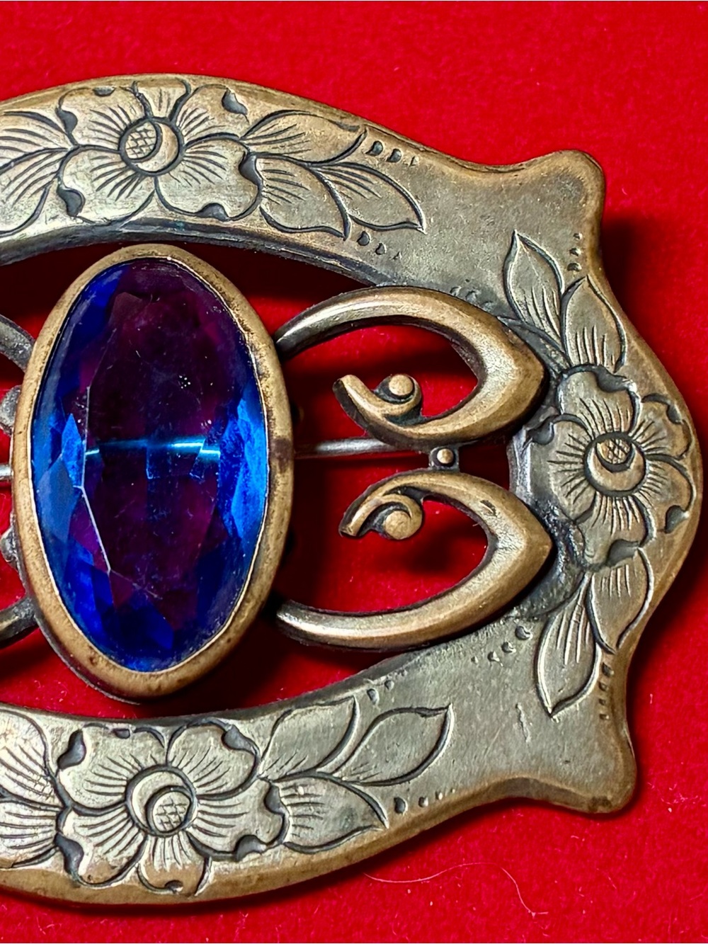 Brass 1900 antique Men’s Sash Pin with floral design has a Blue Stone and 2-5” w